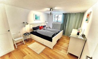 Elternschlafzimmer Bett 180x200 (Babybett verfügbar), Foto: Hüller